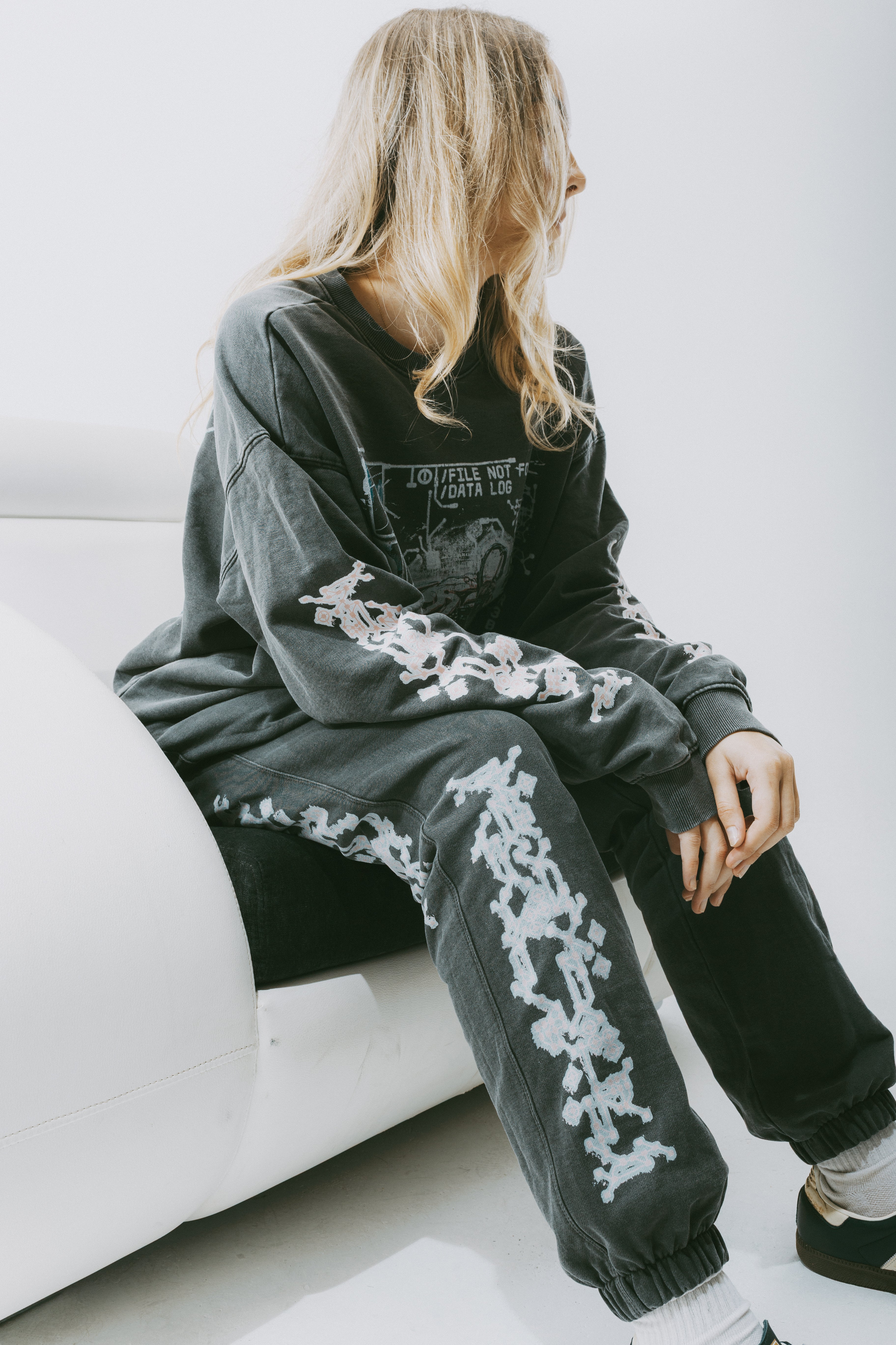 Safe Storage Joggers Eclipse Grey worn by a model, showcasing the oversized tapered fit and stylish design.