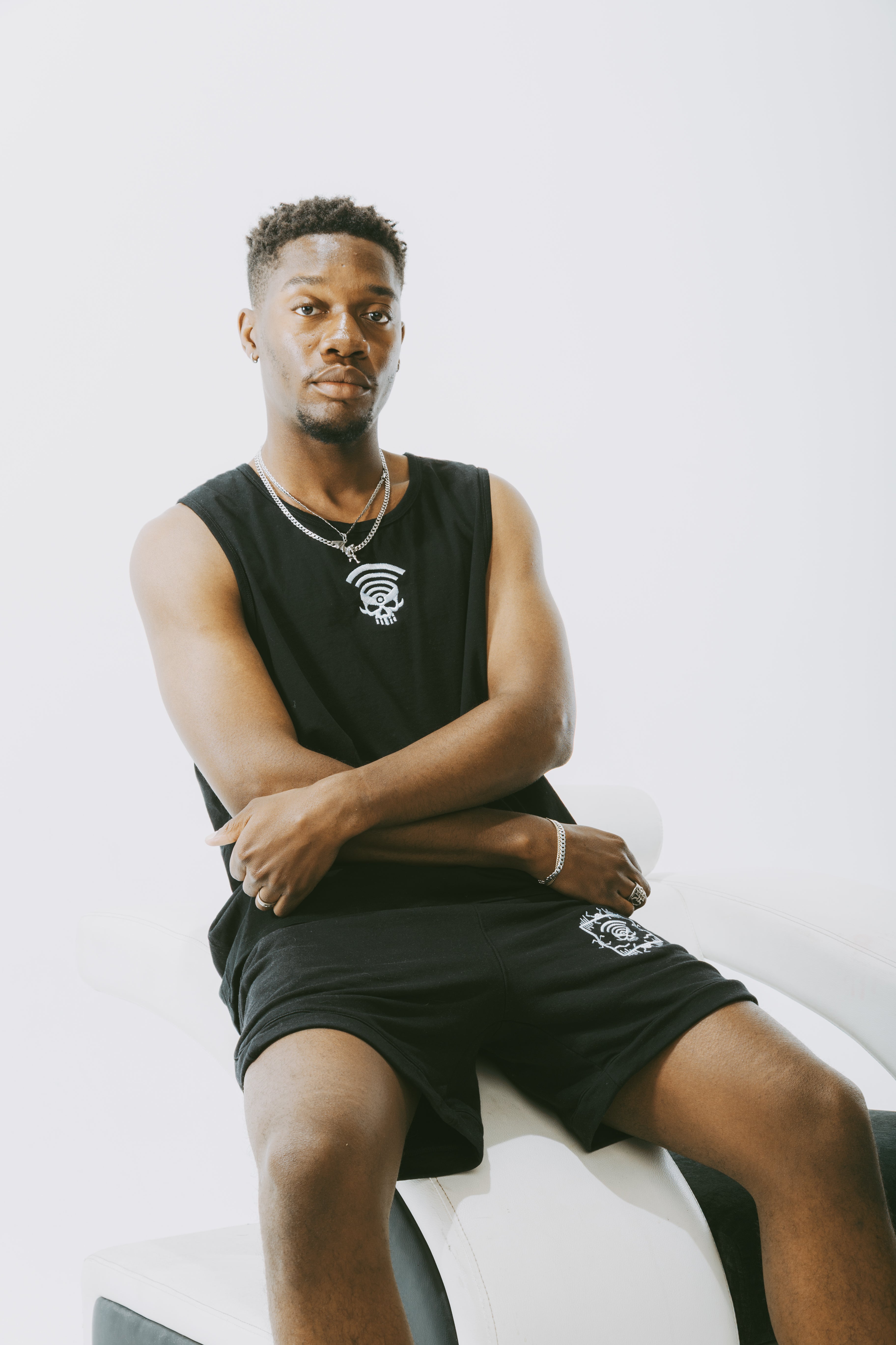 Dead Signal Tank — embroidered streetwear tank top front view on model.